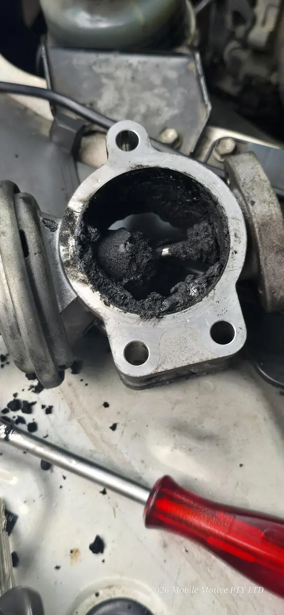 Carbon build-up found during engine diagnosis