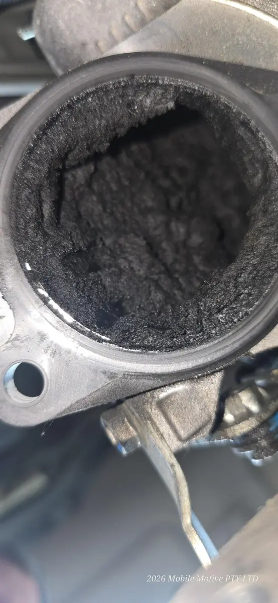 Heavy intake carbon build-up inside an engine component